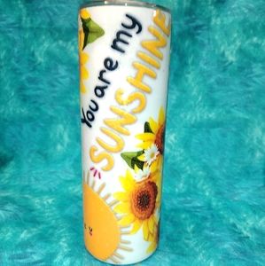 20 oz stainless steel tumbler with You are my sunshine on it.